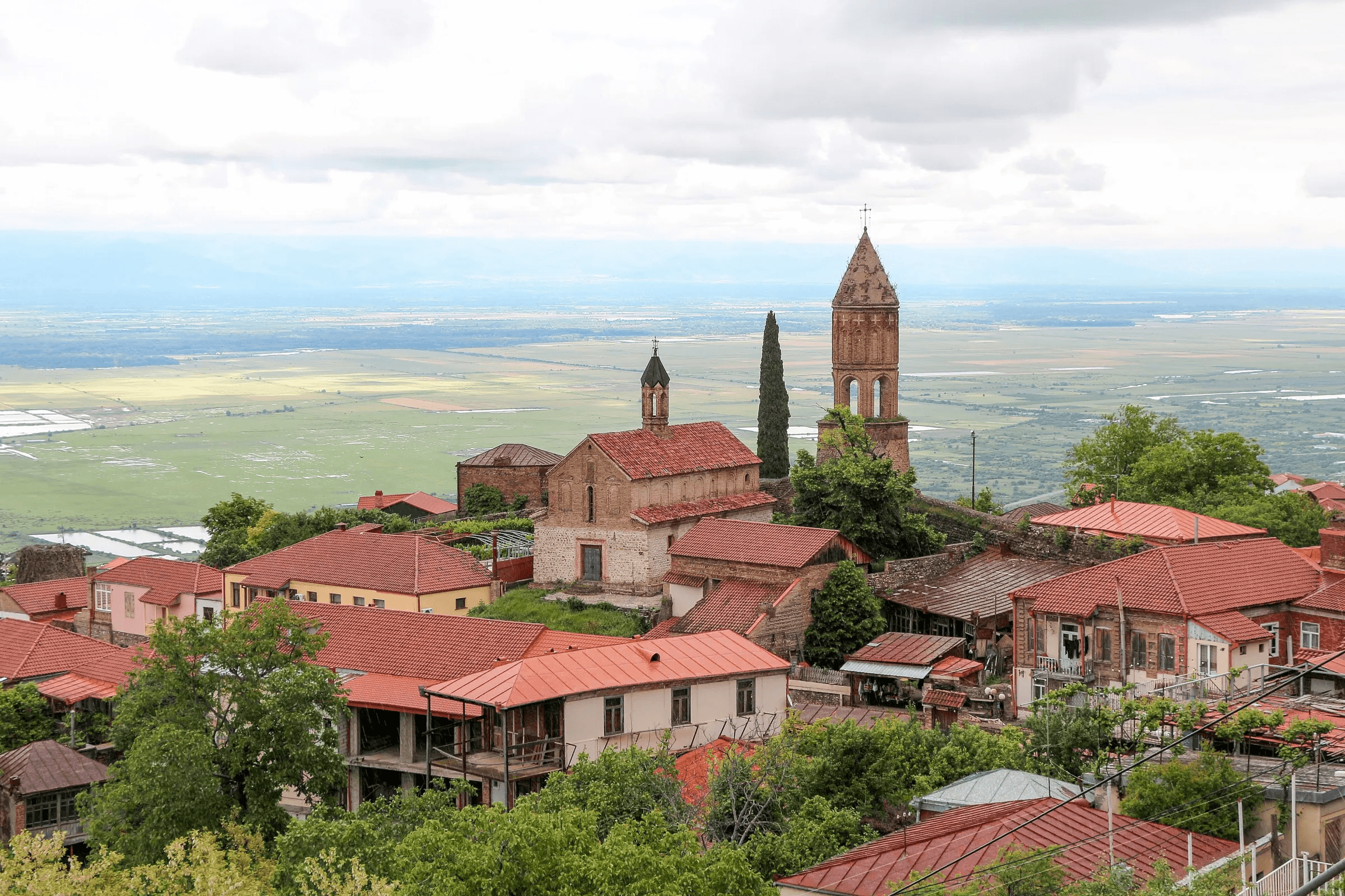 Sighnaghi on its hill above the Alazani Valley, with the Caucasus in the distance
